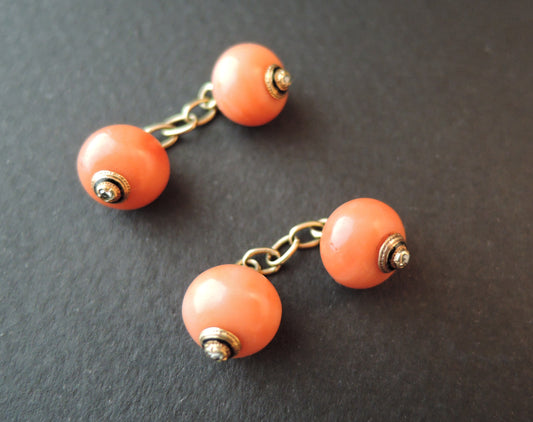 Paire de boutons de manchette corail, diamant or 18K