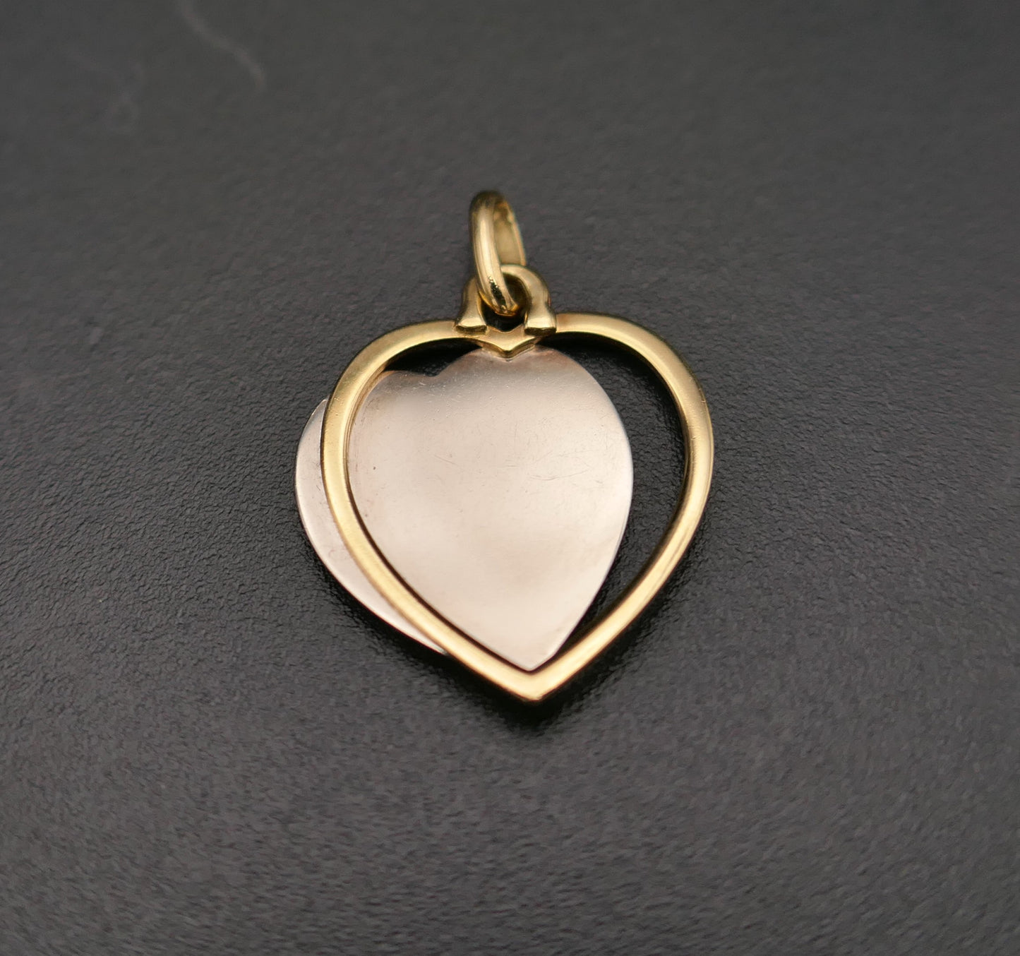 Médaille Augis, Coeur en or blanc et or jaune 18 Carats.