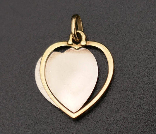 Médaille Augis, Coeur en or blanc et or jaune 18 Carats.