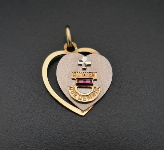 Médaille Augis, Coeur en or blanc et or jaune 18 Carats.