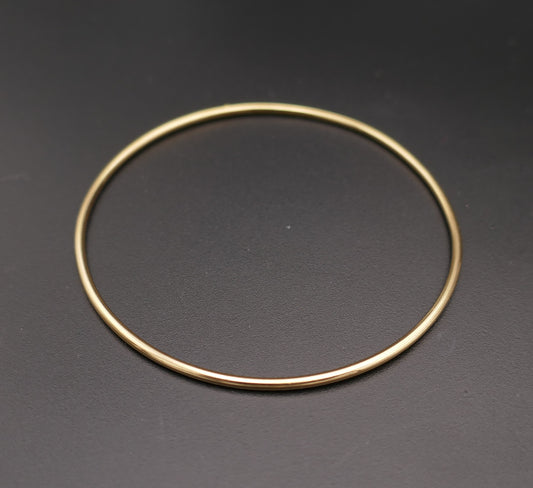 Bracelet jonc rigide, or jaune 18 carats.