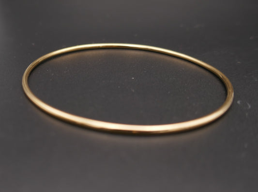 Bracelet jonc rigide, or jaune 18 carats.