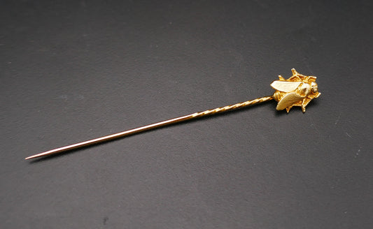 Epingle à cravate, or 18 carats.